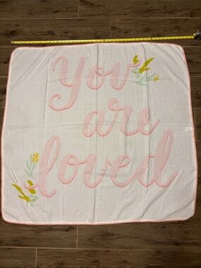 Cloud Island: White Muslin Blanket with Pink Script and Yellow Floral Accents